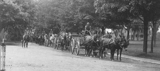 Traffic backed up at a town-center traffic sign during World War I in the early 1900s. (Photo courtesy of Harvard Historical Society)