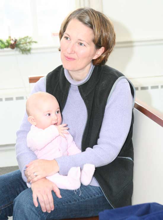 This year’s Baby Jesus, Lucy Maiore, awaits her acting debut on the lap of her mother, Joyce Maiore.