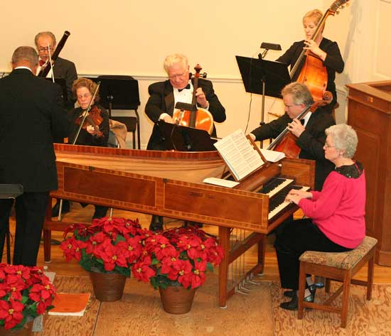 Star Stevens plays harpsichord with the orchestra.