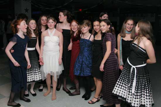 A group of middle-school girls socialize during the Snowflake dance. (Photo by Rob Williams)