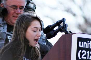 Moriah Arnold addresses a crowd of more than 100,000 people at  an anti-war rally in Washington, D.C.  as her stepfather, Mark Vanderwerf, looks on.(Courtesy photo)