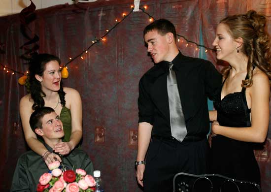 Seniors Mike Hulit and Maggie Schulz, right, chat with Rob Williams and Courtney Kenyon at the Snowball Saturday evening. 
