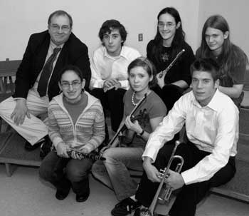 (Left to right) Bromfield music teacher Tom Reynolds, Paul Jordan Talbot, Amy Valladares, Kyle Quarles, Vanessa Jacobson, Kristina Kronauer, and Tim Smetana. (Courtesy photo by Charles Kronauer)