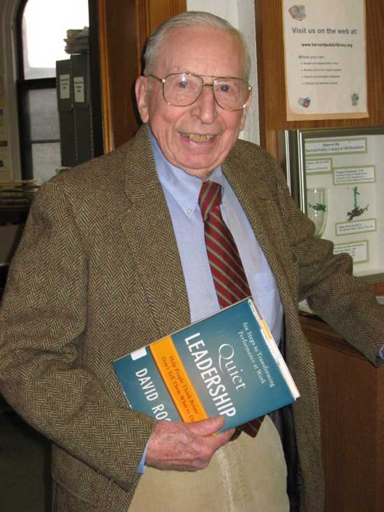 Jeff Harris checks out the last book before the library closes its doors. (Photo by Laura Andrews)
