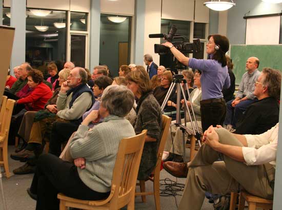Jackie Normand from Harvard's cable committee tapes the event.