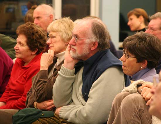 Janice Goodell, Carlene Phillips, David Durrant, and Pam Durrant are among the debate attendees.