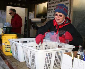 Ralph Goodell and Mhairi Paget sort plastic as volunteers in the recycling center at the transfer station. (Photo by Lisa Acuikewicz) Ralph Goodell and Mhairi Paget sort plastic as volunteers in the recycling center at the transfer station. (Photo by Lisa Acuikewicz)