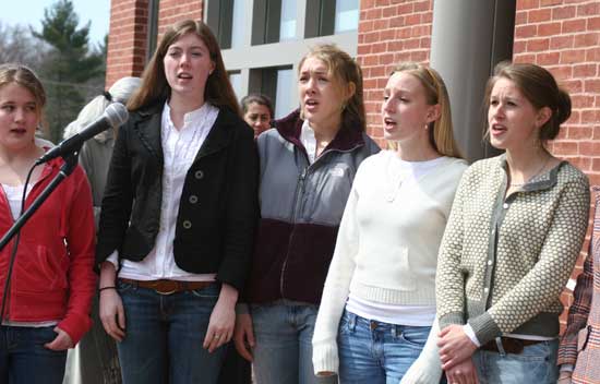 Bromfield a capella singers (left to right) Alyson Marteney, Lily Narbonne, Annie Lierhaus, Henley Siegrist, and Eliza Ives perform at the library's opening.