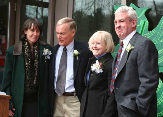 Left to right: Library Trustee Chairman Ginger Kendall, Building Committee Co-chairman Pete Jackson, Library Director Mary Wilson, and Building Committee Co-chairman Roy Moffa accept applause at the opening ceremonies.