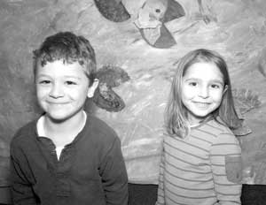 Charlie Carbonell and Rachel Shrives in front of their “Water Lilies.” (Courtesy photo by Kathryn Costello) Charlie Carbonell and Rachel Shrives in front of their “Water Lilies.” (Courtesy photo by Kathryn Costello)