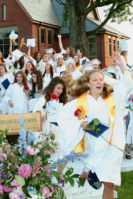 Emily Firment leads her classmates as the Bromfield class of 2007 explordes off the stage at the end of the graduation ceremony.