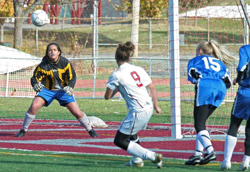 In one of many great saves of the day, Bromfield goalkeeper Lindsey Burke prepares to catch a ball shot by Newburyport’s Maggie Mahoney.