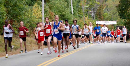 More than 250 runners head up the first hill in the 10-mile race