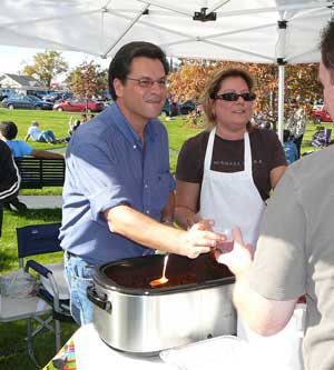 Butch and Pam Bisson of Pepperell serve samples of their prize-winning chili. (Courtesy photo by Worth Robbins) Butch and Pam Bisson of Pepperell serve samples of their prize-winning chili. (Courtesy photo by Worth Robbins)