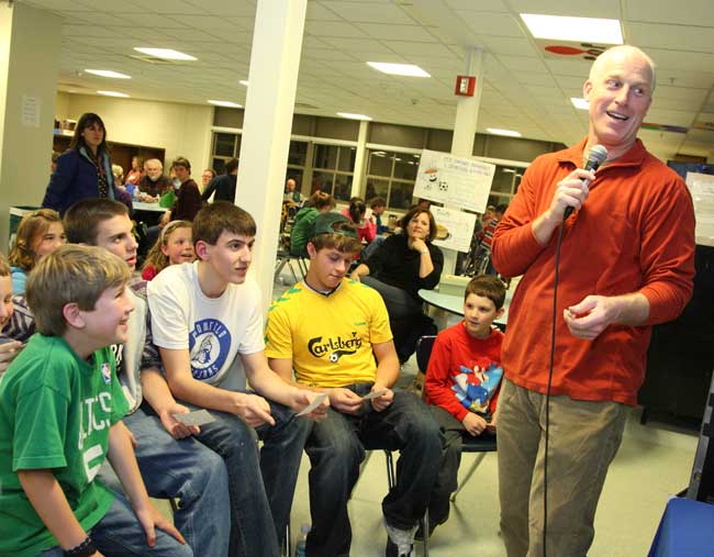 Principal Jim O’Shea calls out bingo numbers to a rapt audience.