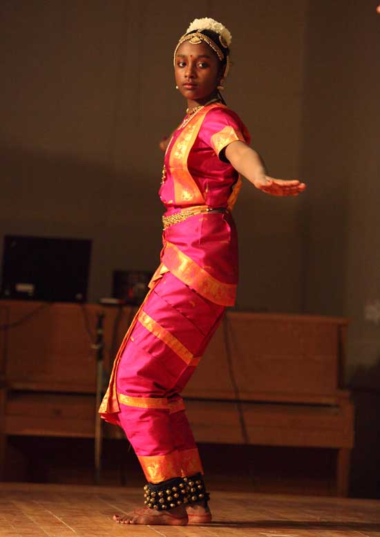 Sixth-grader Anjani Hodgkins performs a classical Indian dance.