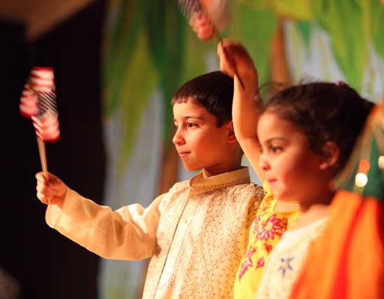 Arjun Khurana and Amitha Khurana were part of a group displaying Indian diversity, performing the Indian national anthem.