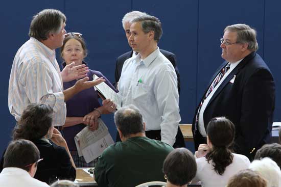 Finance Committee Chairman George McKenna, Deborah Skauen-Hinchliffe, Selectman Leo Blair, Board of Health Chairman Tom Philippou, and Town Administrator Tim Bragan discuss the Board of Health's budget.