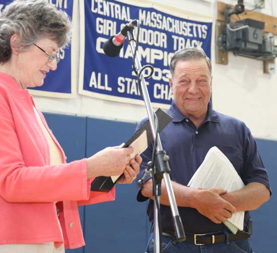 Selectwoman Lucy Wallace presents the Citizen of Note award to Paul Willard at Annual Town Meeting in May.