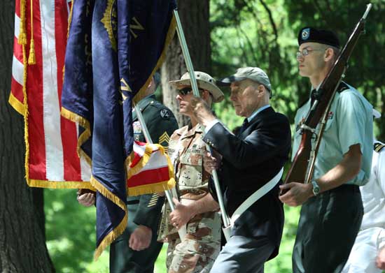 From left: Oleh Dutkewych, Fred Hinchliffe, and John McClure lead the Memorial Day Parade through Bellevue Cemetery.