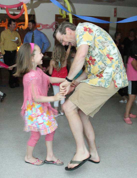 Phoebe Clark and her dad Tim have a ball at the Girl Scouts' parent-daughter dance.