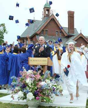 Principal Jim O’Shea gives a hand to Bromfield’s Class of 2009 as Caitlin Nygren leads her classmates off the stage. (Photo by Lisa Aciukewicz) Principal Jim O’Shea gives a hand to Bromfield’s Class of 2009 as Caitlin Nygren leads her classmates off the stage. (Photo by Lisa Aciukewicz)