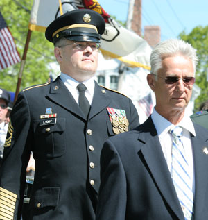 From left: Dennis Lyddy and Don Green march in last year’s Memorial Day Parade. (Photo by Lisa Aciukewicz)