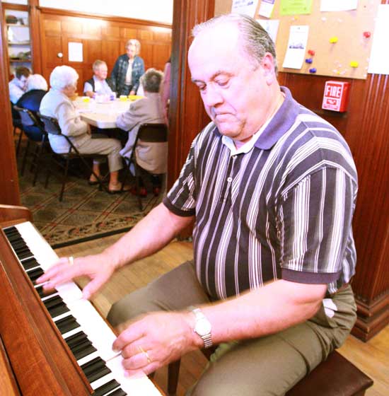 Joe Theriault of Tahanto Trail plays a rousing “You Are My Sunshine” before a Council on Aging luncheon.