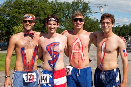 Showing American pride are Bromfield alums (from left) Phil Luck, Mike Epstein, Trevor Miller, and Brad Hutchinson. (Photo by Ellen Harasimowicz)