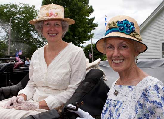 Judy House and June Gould, both of Chelmsford, are all dressed up to ride in their 1913 Buick in the parade. (Photo by Ellen Harasimowicz)