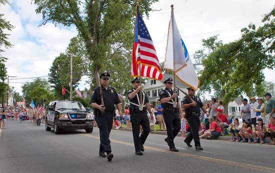 Harvard police officers led the parade. (Photo by Ellen Harasimowicz)