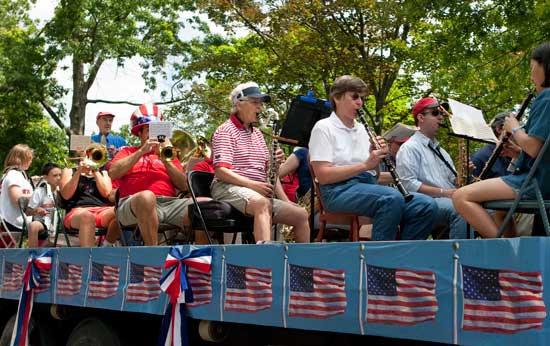 The Harvard Town Band rides in style. (Photo by Ellen Harasimowicz)