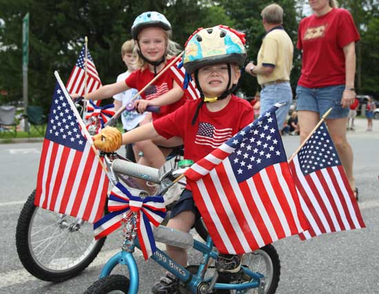 Braden DeZutter bicycled in the parade with his cousin Jack Steen.