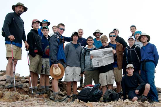 Harvard Boy Scout Troop 1 is prepared with the Press on Mount Baldy in New Mexico.