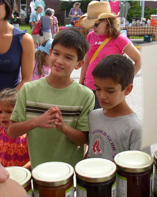 Nate and Gabe Colena eye jars of jams and jellies.