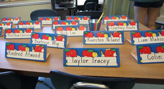 Place cards in Mrs. Sullivan’s HES classroom welcome new students.