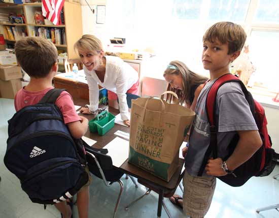 The Armstrong family checks out Will’s new digs in Mr. Snell’s second-grade class at the Open House on Aug. 31. Left to right are Will, Sherry, Kaeli, and Jack Armstrong.