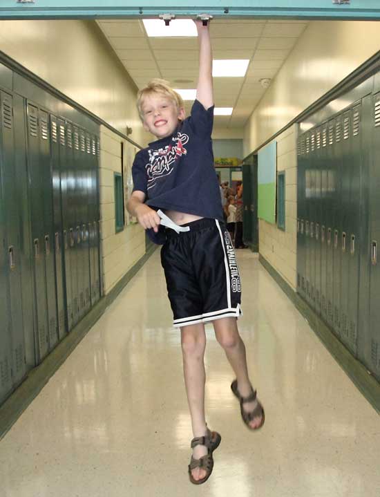 Colin Cleary tags the top of the doorwaywith his hand&mdash;as only a newly minted fifth grader can&mdash;as he heads to class at the elementary school.
