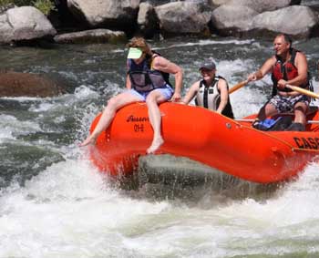 Willie Wickman braves the whitewater at the front of the personnel boat at a First Descents session in Idaho in August. (Courtesy photo)