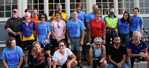 A group of Ride Far bicyclists pose in front of the General Store on a break from their Sept. 13 ride through Harvard.  (Courtesy photo)