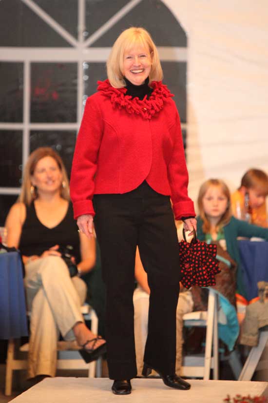 Library Director Mary Wilson looks smashing in a garnet boiled wool jacket by Tribal.