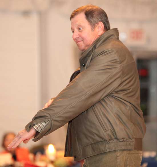 Board of Selectmen Chairman Ron Ricci points out the softness of  his ultra-lite leather jacket by Remy.