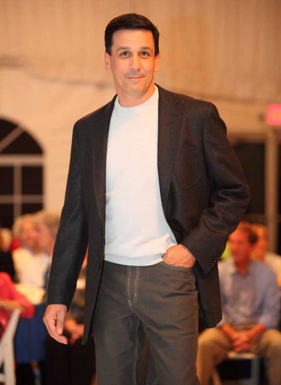 Firefighter Bill Barton looks comfortable in Tommy Bahama jeans and a Raffi mock jersey covered by an S. Cohen sports coat.