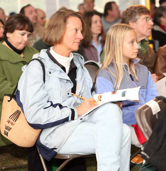Ann Lee Road resident Lynn Seymour and her daughter Sarah take in the auction.