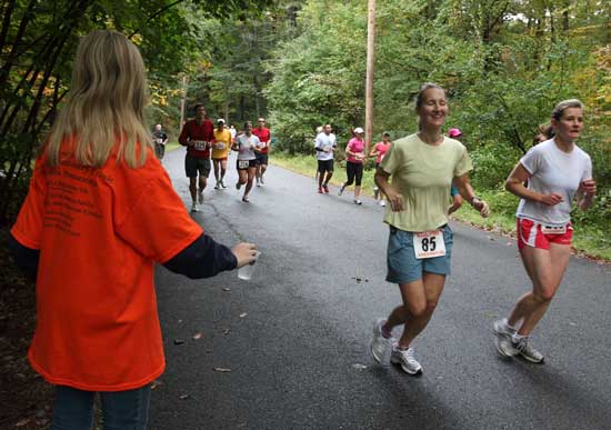 Joyce Maiore (#85) of Slough Road edges past her competition.