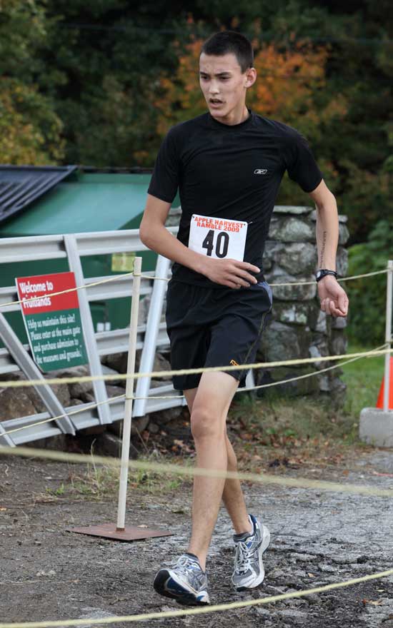 Seventeen-year-old Bromfield Senior Max Flaton crosses the finish line in seventh place with a time of 1:01:00. 