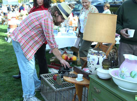 Jeff Venier looks for hidden treasure at the flea market.