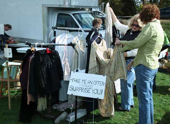 Katherine Grant and Tracey Bird of Townsend admire some vintage dresses.