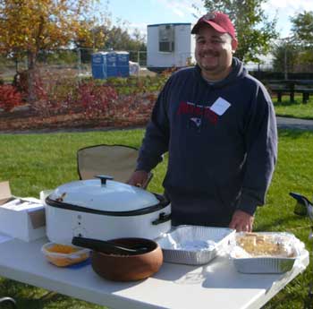 Winner Michael Harmon of Ayer, with his jalapeno-infused chili. (Photo by Worth Robbins) Winner Michael Harmon of Ayer, with his jalapeno-infused chili. (Photo by Worth Robbins)