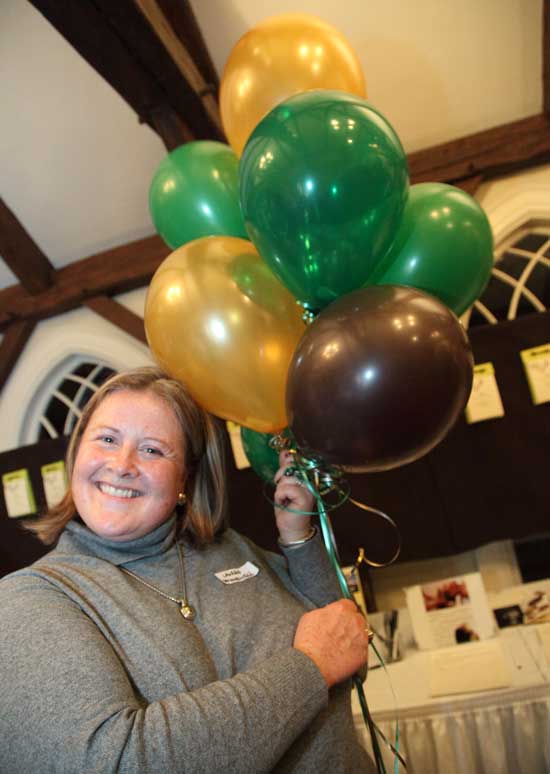 Lauren Hunnewell sells balloons at the Parent Teacher Organization’s Fall Fête held at Fruitlands on Oct. 17. Recipients popped the balloons to reveal special prizes noted inside.